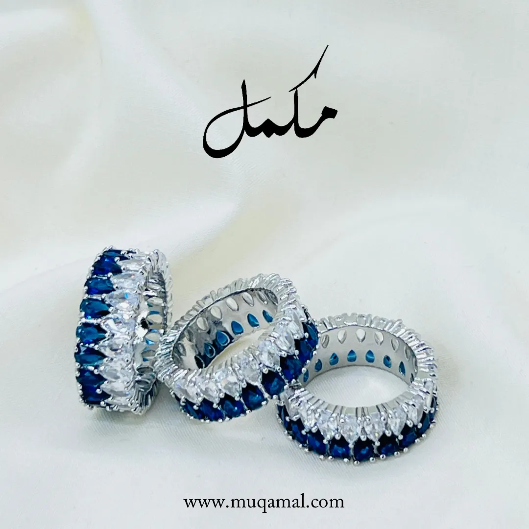 Distinctive blue sapphire lobes with zircon silver ring