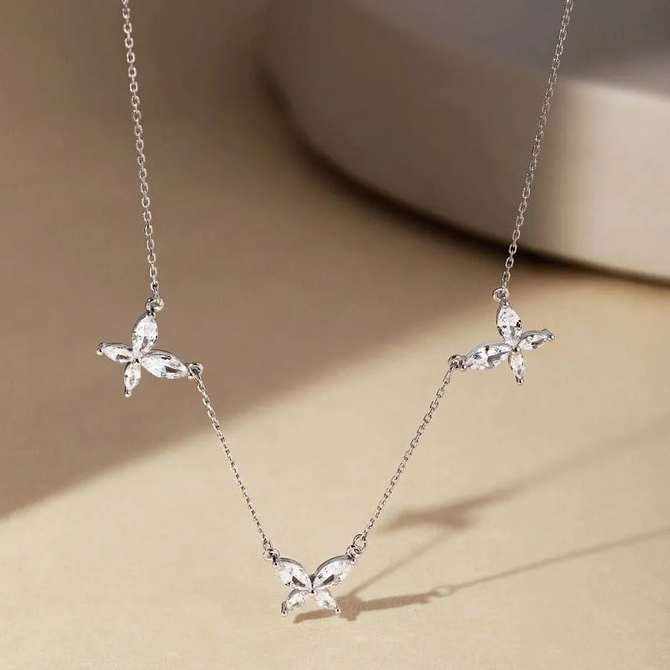 Three butterfly necklaces